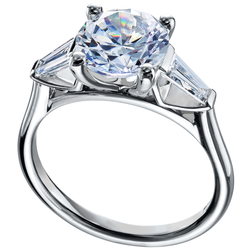 Timeless Three-Stone Platinum Engagement Ring Features 2 Tapered Baguette Side Diamonds Weighing 0.48  Carats Total. The Ring Is Perfectly Designed To Fit Flush